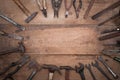 Collection of antique woodworking handtools on a rough workbench old wooden Royalty Free Stock Photo