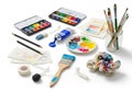 In a glass jar, a palette with paint blobs, a watercolor set, a Royalty Free Stock Photo