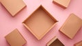 A collection of assorted brown cardboard boxes on a soft pink backdrop, offering a perfect mockup for various designs Royalty Free Stock Photo