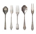 Collection of beautiful old vintage forks, spoons and knife isolated on white background. Top view. Retro silverware Royalty Free Stock Photo