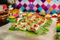 Collection of betel leaf banarasi paan and fire paan displayed for sale at a shop with selective focus and blurred