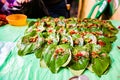 Collection of betel leaf banarasi paan and fire paan displayed for sale at a shop with selective focus and blurred