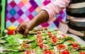 Collection of betel leaf banarasi paan and fire paan displayed for sale at a shop with selective focus and blurred