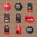 Collection Of Black Friday Tags On Wooden Textured Background Shopping Icons Royalty Free Stock Photo