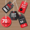 Collection Of Black Friday Tags On Wooden Textured Background Shopping Icons And Logos Set Design Royalty Free Stock Photo