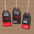 Collection Of Black Friday Tags On Wooden Textured Background Shopping Icons And Logos Set Design Royalty Free Stock Photo