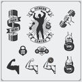 Collection of black and white fitness labels, emblems, badges, logos and design elements. Silhouette of bodybuilder and arm muscle