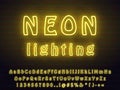 Beautiful bold yellow neon font set. letters, numerals, signs, symbols and icons for advertising and web design Royalty Free Stock Photo