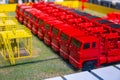 a collection of bright red model trucks or construction vehicles Royalty Free Stock Photo