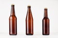 Collection brown beer bottles 500ml and 330ml mock up. Royalty Free Stock Photo