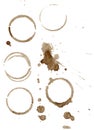 Collection of brown coffee stains and splatters isolated on whit