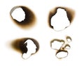 Collection of burnt holes in a piece of paper