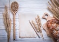 Collection of carving board wheat-rye ears baked bread stick woo Royalty Free Stock Photo