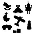 A collection of children\'s silhouette toys. Car, robot, boat, plane