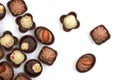 Collection of chocolates on a white background. Confectionery products, top view