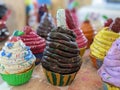 A collection of clay model cupcakes muffins