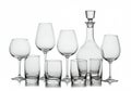 A collection of clear glassware on a reflective surface. The arrangement includes a Royalty Free Stock Photo