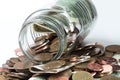 Collection of coins in a jar Royalty Free Stock Photo