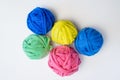 Collection of colored tangles from used rags on a white background, top view. Recycled knitting material. Royalty Free Stock Photo