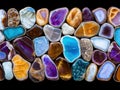 Collection of colorful agate slices arranged in a row