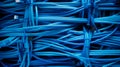 A collection of colorful Blue data cables and connectors, representing the interconnectedness of modern information Royalty Free Stock Photo