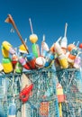 Collection of colorful fishing or lobster trap buoys and markers at wharf in Provincetown, Massachusetts, USA Royalty Free Stock Photo