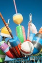 Collection of colorful fishing or lobster trap buoys and markers at wharf in Provincetown, Massachusetts, USA Royalty Free Stock Photo