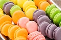 Collection of colorful French macarons closeup as a background. Selective focus