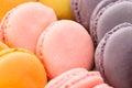 Collection of colorful French macarons closeup as a background. Selective focus