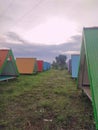 A collection of colorful inns with unique architecture in a natural tourism area in Indonesia