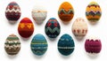 Collection of Colorful Knitted Easter Eggs with Intricate Designs on White Background Royalty Free Stock Photo