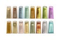 Collection of colorful metal graters arranged in two rows on a white background showcasing various kitchen tools Royalty Free Stock Photo