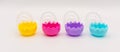 A collection of colorful plastic Easter eggs on white Royalty Free Stock Photo