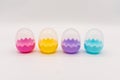 A collection of colorful plastic Easter eggs on white Royalty Free Stock Photo