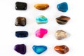 Collection of colorful semiprecious gemstones on white background