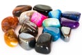 Collection of colorful semiprecious gemstones on white background