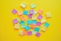 A collection of colorful post-it notes stuck to a bright yellow surface, great for illustrations and creative projects Royalty Free Stock Photo
