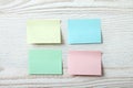 Collection of colorful post it paper note on white wooden background Royalty Free Stock Photo