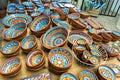 Collection of colorful pottery from a local craft store on display. Handmade ceramic gift shop in Lisbon, Portugal