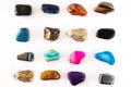 Collection of colorful semiprecious gemstones on white background