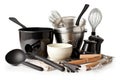 a collection of cooking utensils, including pots and pans, whisks and spoons, arranged on a white background Royalty Free Stock Photo
