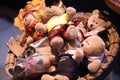 a collection of cute brown teddy bears in a basket