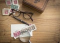 Collection of dad`s favorite things with antique stamps and magnifying glass with pen and leather box