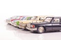 Collection of die-cast car models isolated on the white background Royalty Free Stock Photo