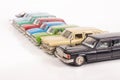 Collection of die-cast car models isolated on the white background Royalty Free Stock Photo