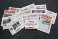 Collection of different Chinese newspapers including state media and market-oriented media