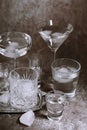 Collection of different glasses filled with cold water with ice Royalty Free Stock Photo