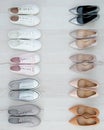 Collection of different shoes on floor, flat lay Royalty Free Stock Photo