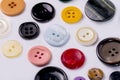 A collection of different spare clothing buttons.