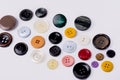 A collection of different spare clothing buttons.